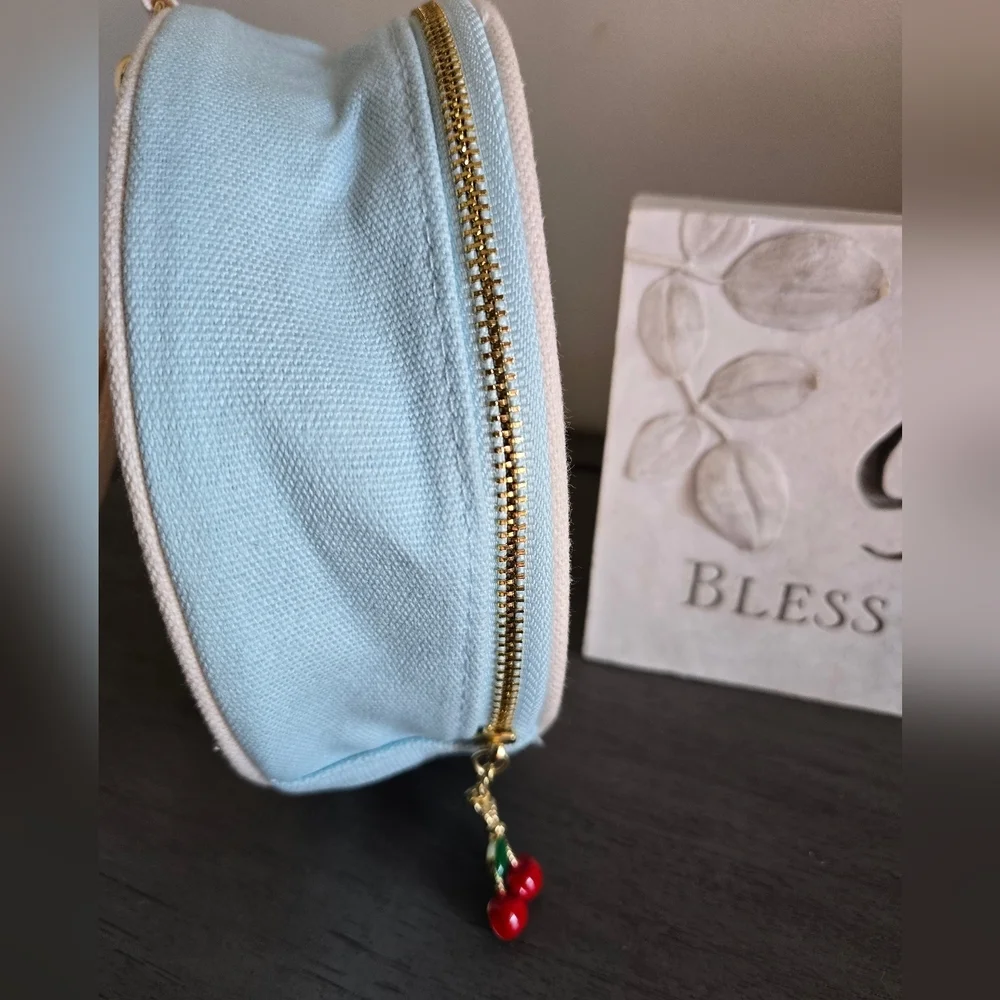 Marc Jacobs Cream Round Cosmetic Bag with Cherry Charm